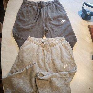 Nike Men's Medium sweat pants. Open hem. Two pairs. Bundle